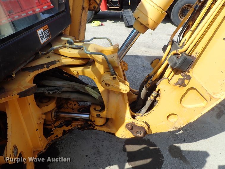 image for item DE1084 1999 John Deere 310E backhoe