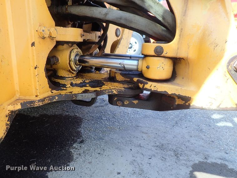 image for item DE1084 1999 John Deere 310E backhoe