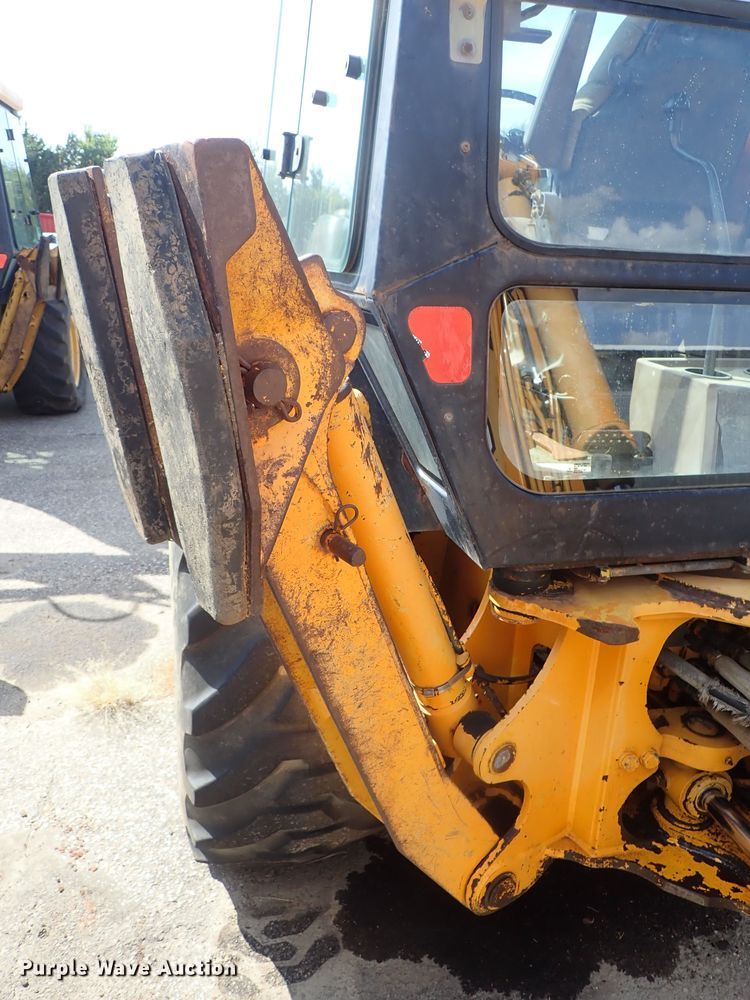 image for item DE1084 1999 John Deere 310E backhoe