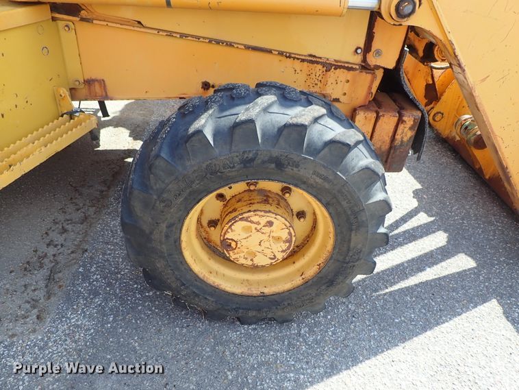 image for item DE1084 1999 John Deere 310E backhoe