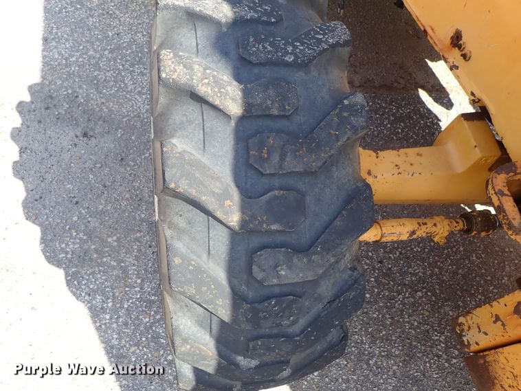 image for item DE1084 1999 John Deere 310E backhoe