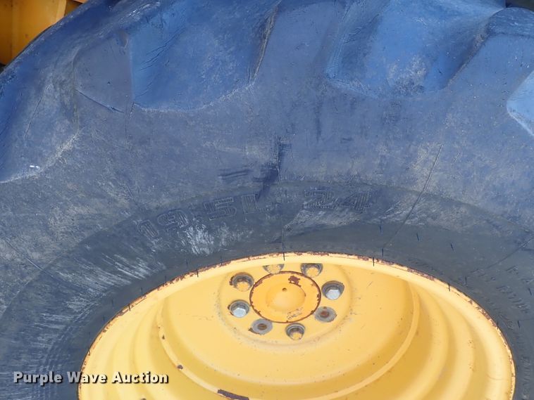 image for item DE1084 1999 John Deere 310E backhoe