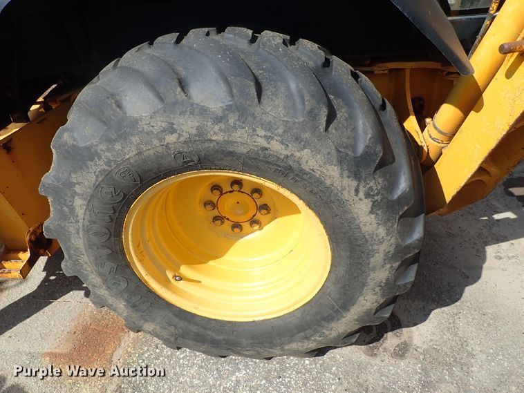 image for item DE1084 1999 John Deere 310E backhoe