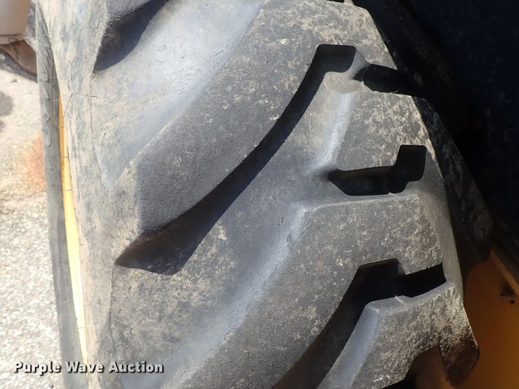 image for item DE1084 1999 John Deere 310E backhoe