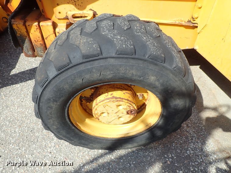 image for item DE1084 1999 John Deere 310E backhoe