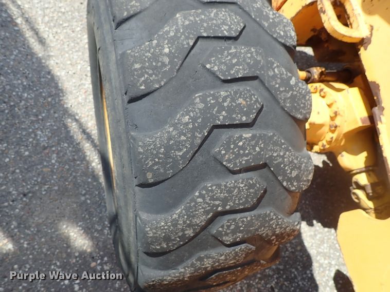 image for item DE1084 1999 John Deere 310E backhoe