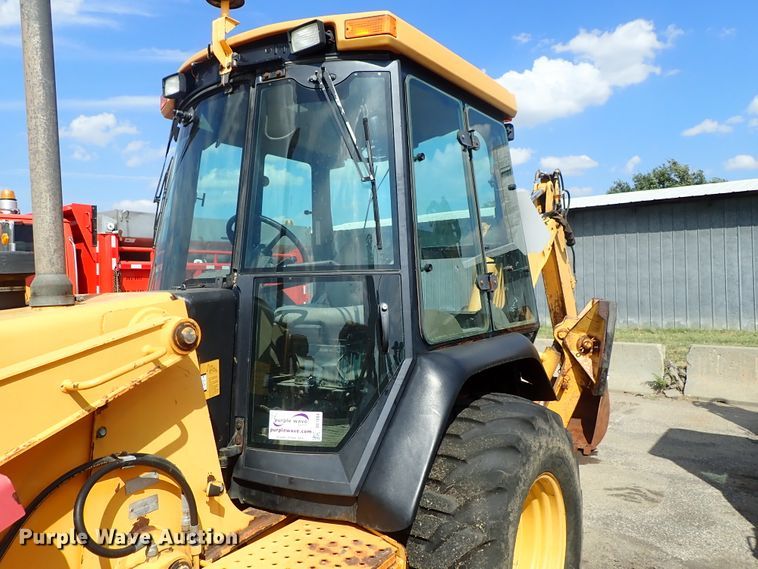 image for item DE1084 1999 John Deere 310E backhoe