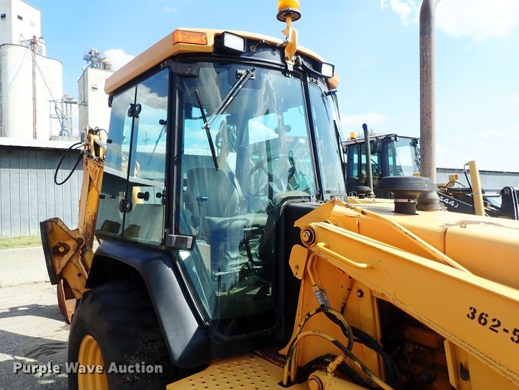 image for item DE1084 1999 John Deere 310E backhoe