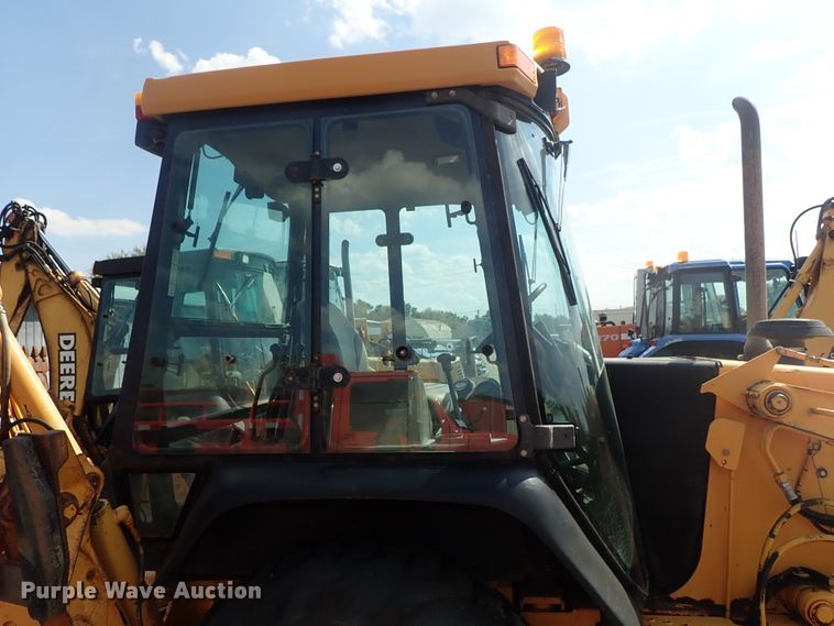 image for item DE1084 1999 John Deere 310E backhoe