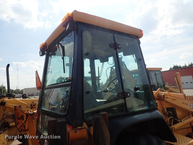 image for item DE1084 1999 John Deere 310E backhoe