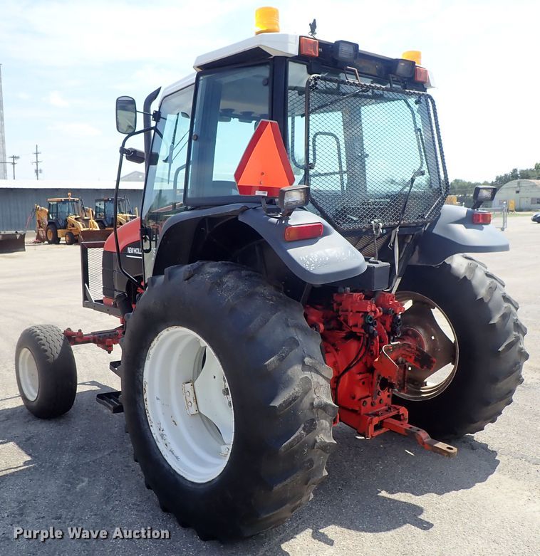 image for item DE1087 1999 New Holland TS100 tractor