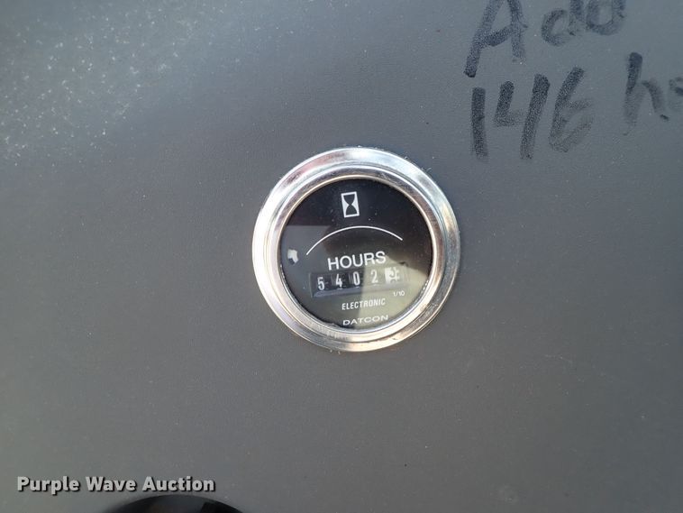 image for item DE1087 1999 New Holland TS100 tractor