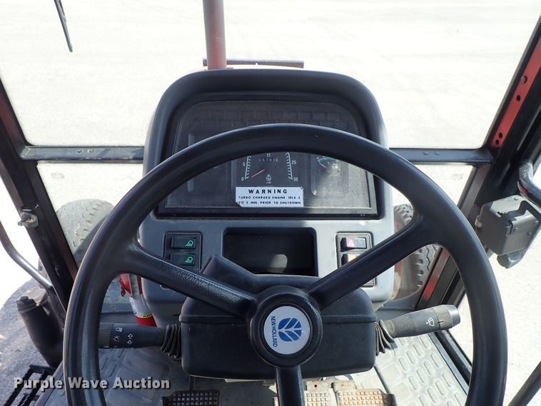 image for item DE1087 1999 New Holland TS100 tractor