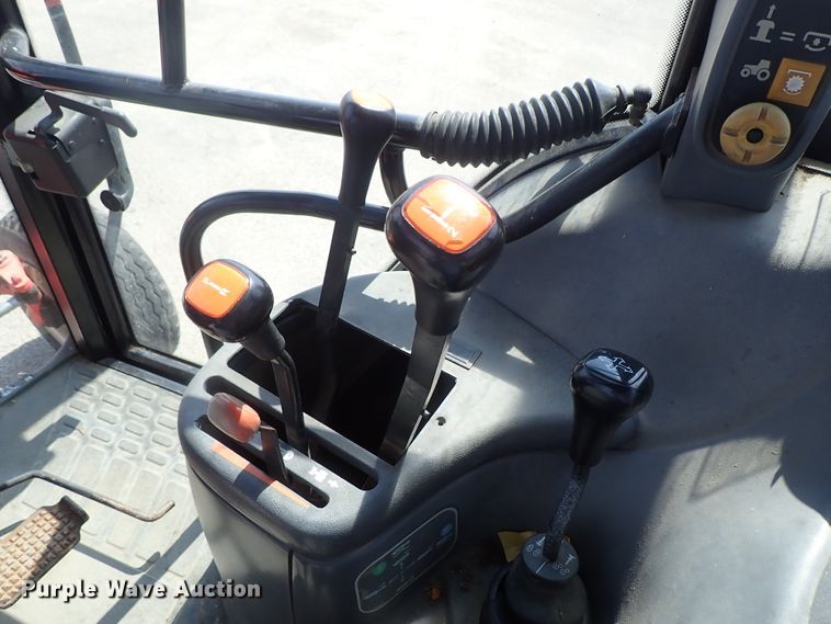 image for item DE1087 1999 New Holland TS100 tractor