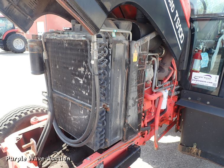 image for item DE1087 1999 New Holland TS100 tractor