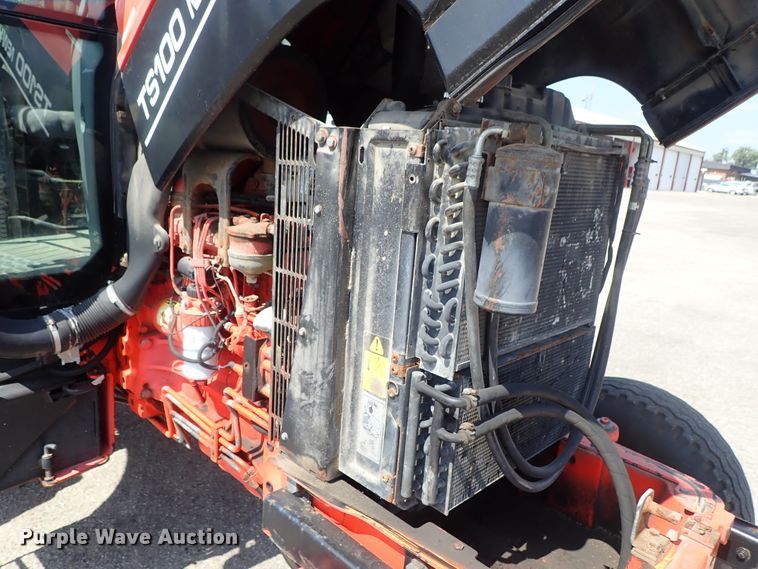 image for item DE1087 1999 New Holland TS100 tractor