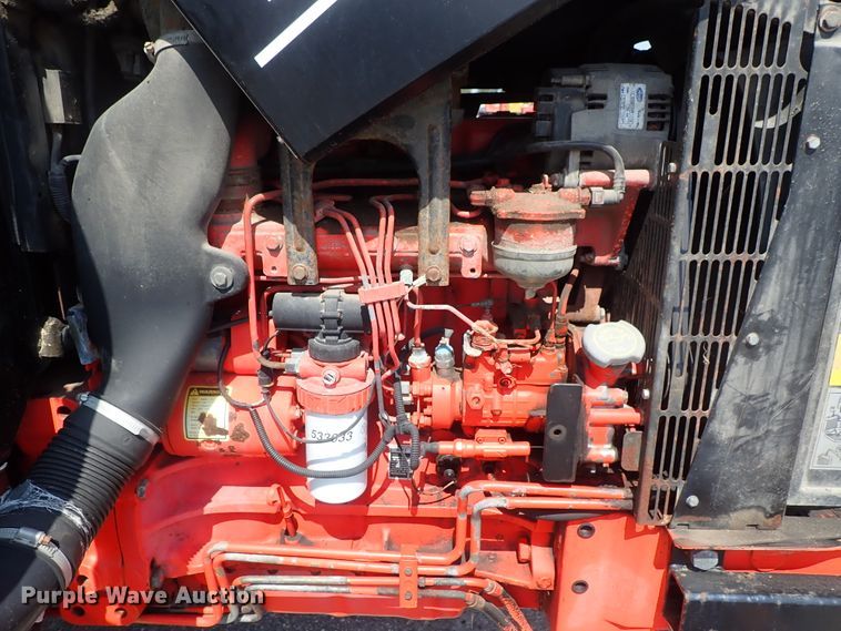 image for item DE1087 1999 New Holland TS100 tractor