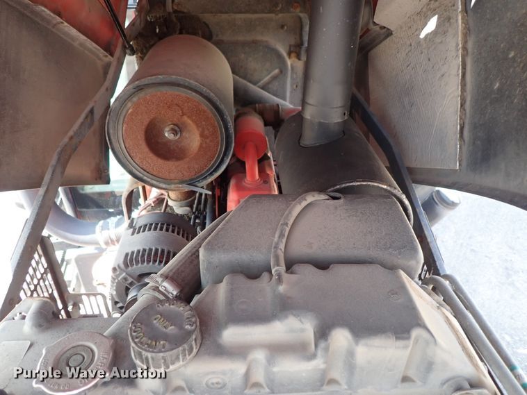 image for item DE1087 1999 New Holland TS100 tractor