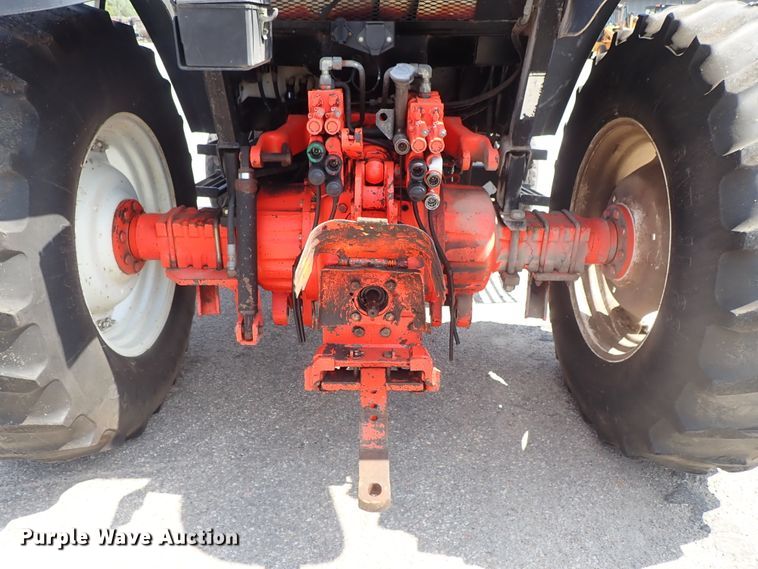 image for item DE1087 1999 New Holland TS100 tractor