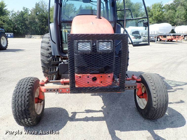 image for item DE1087 1999 New Holland TS100 tractor