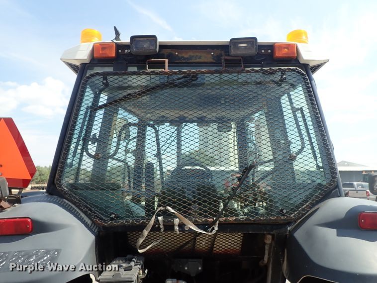 image for item DE1087 1999 New Holland TS100 tractor