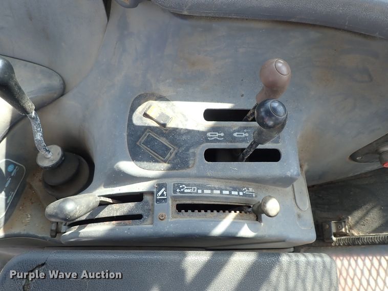 image for item DE1089 1999 New Holland TS100 tractor