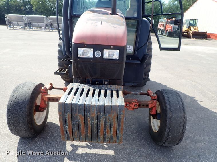 image for item DE1089 1999 New Holland TS100 tractor