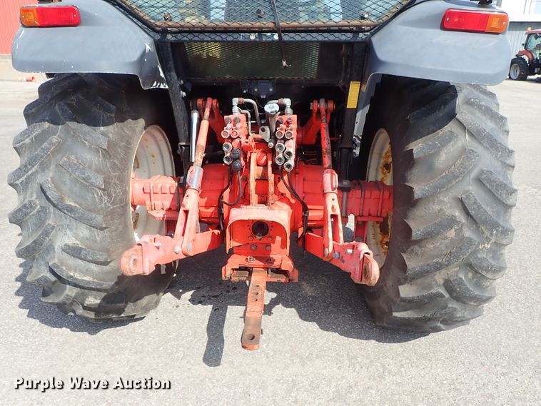 image for item DE1089 1999 New Holland TS100 tractor