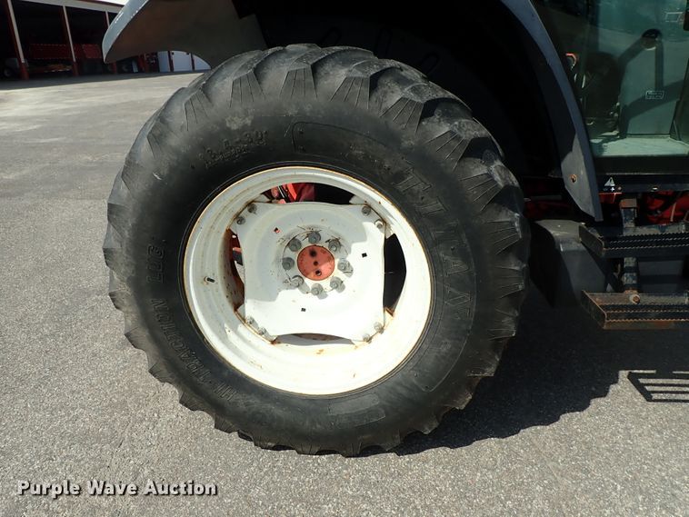 image for item DE1089 1999 New Holland TS100 tractor