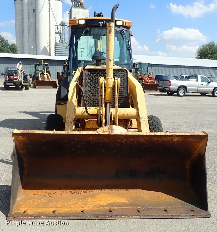 image for item DE1092 1998 John Deere 310E backhoe