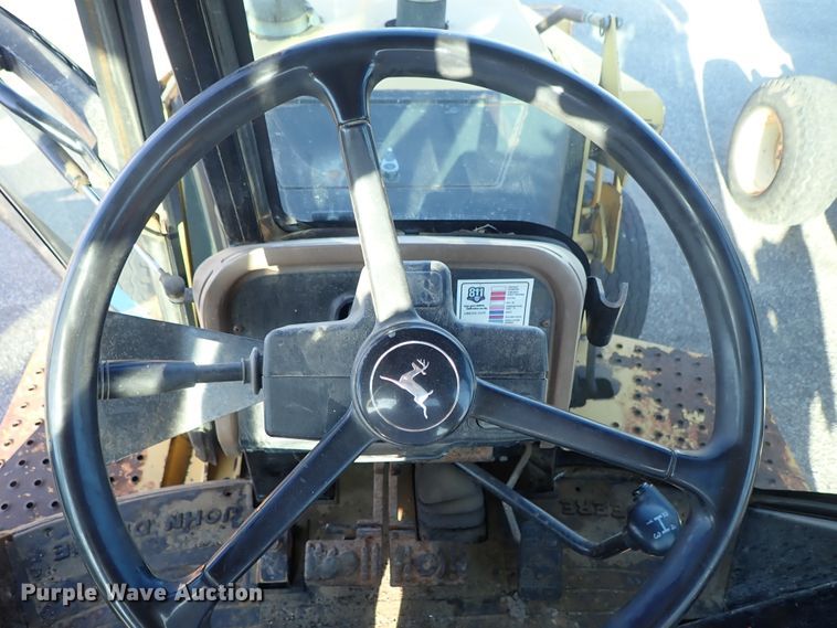 image for item DE1092 1998 John Deere 310E backhoe