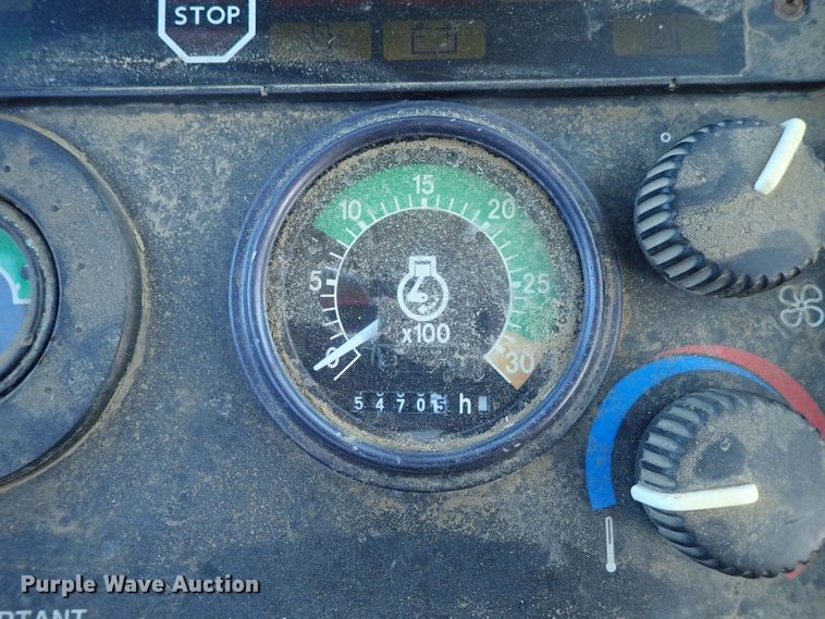 image for item DE1092 1998 John Deere 310E backhoe