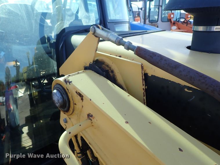 image for item DE1092 1998 John Deere 310E backhoe