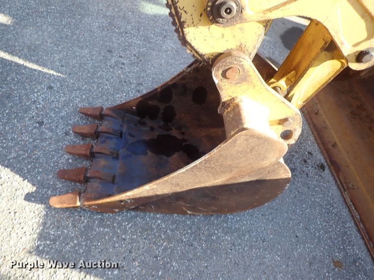 image for item DE1092 1998 John Deere 310E backhoe