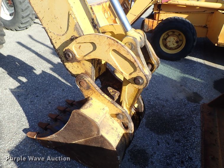 image for item DE1092 1998 John Deere 310E backhoe