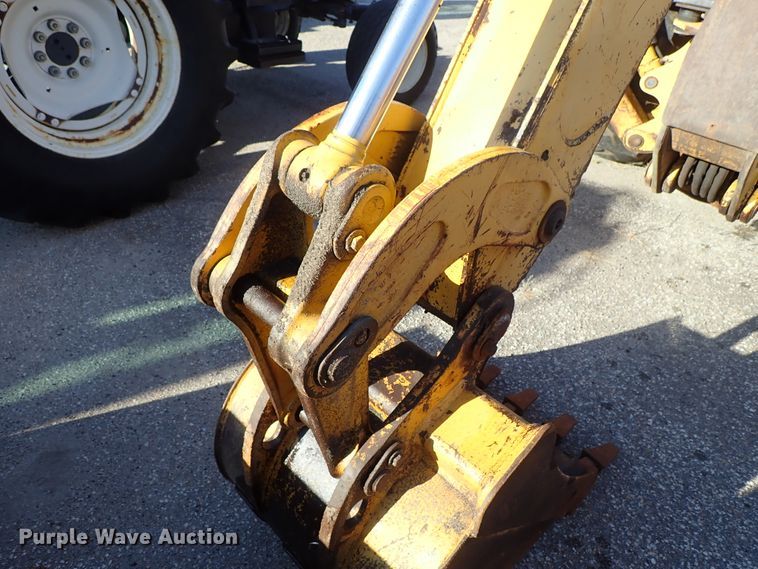 image for item DE1092 1998 John Deere 310E backhoe