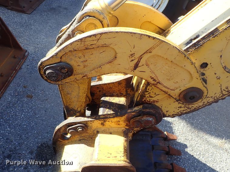 image for item DE1092 1998 John Deere 310E backhoe