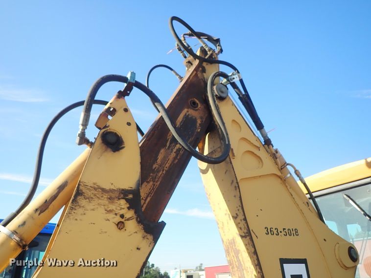 image for item DE1092 1998 John Deere 310E backhoe