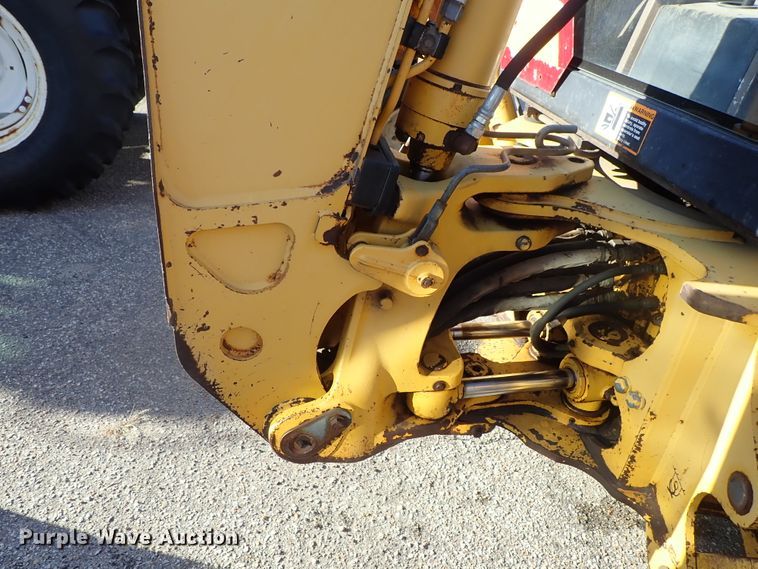 image for item DE1092 1998 John Deere 310E backhoe