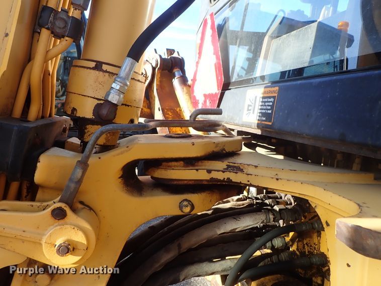 image for item DE1092 1998 John Deere 310E backhoe