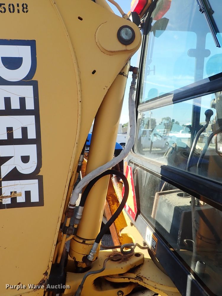 image for item DE1092 1998 John Deere 310E backhoe