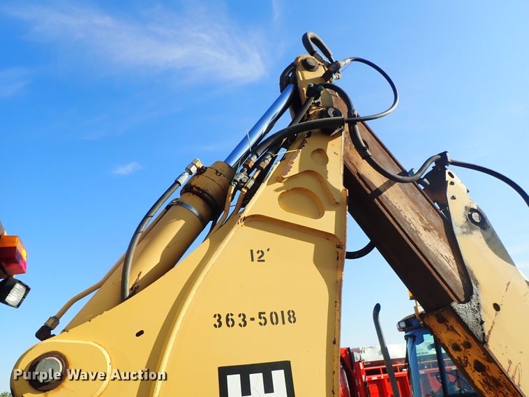 image for item DE1092 1998 John Deere 310E backhoe