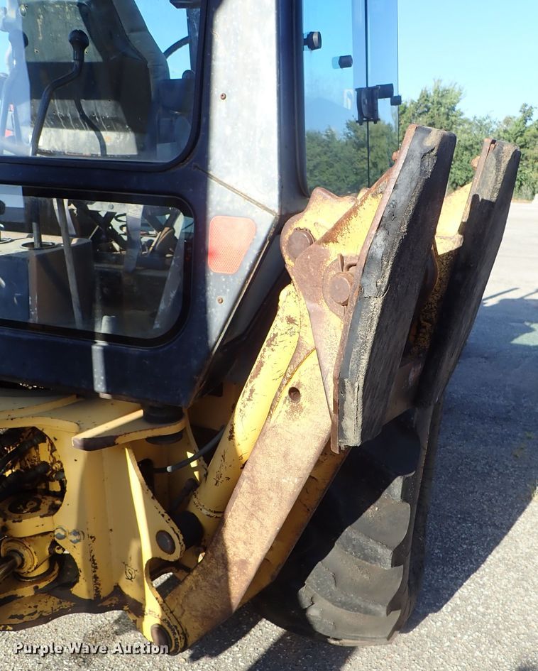 image for item DE1092 1998 John Deere 310E backhoe