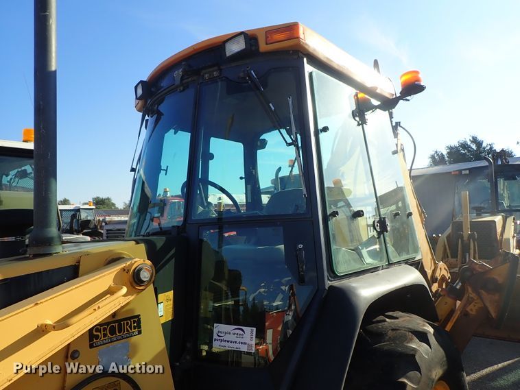 image for item DE1092 1998 John Deere 310E backhoe