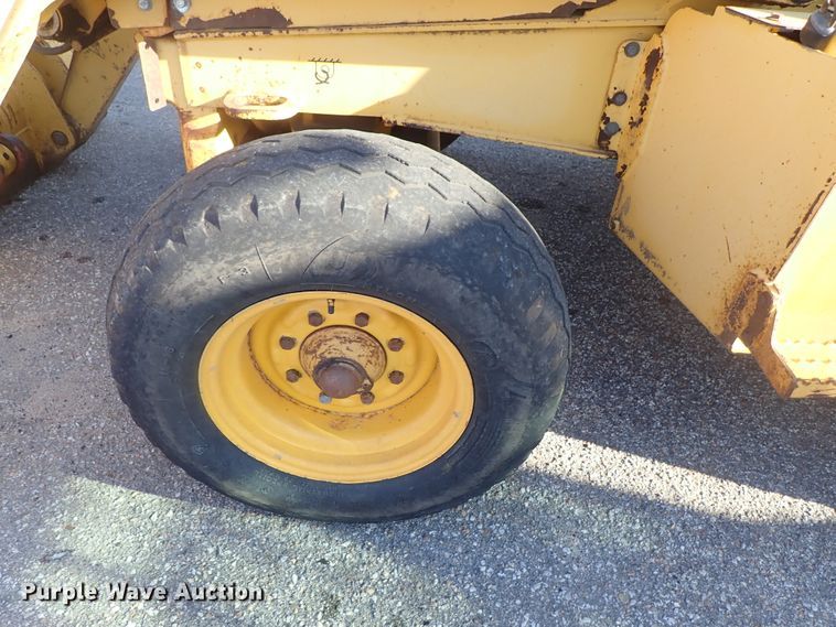 image for item DE1092 1998 John Deere 310E backhoe