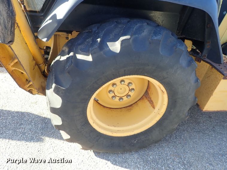 image for item DE1092 1998 John Deere 310E backhoe