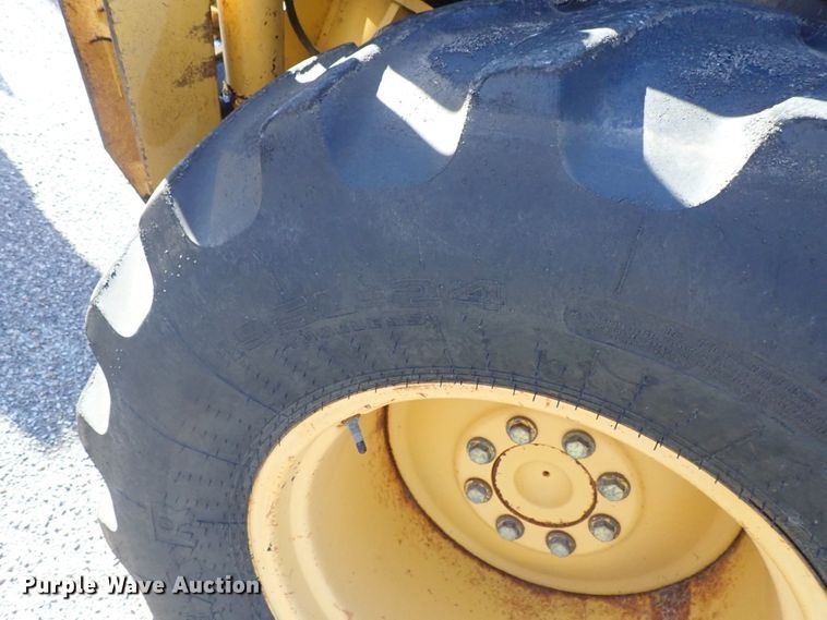 image for item DE1092 1998 John Deere 310E backhoe