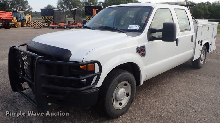 image for item DE1093 2008 Ford F250 Super Duty Crew Cab utility bed pickup truck