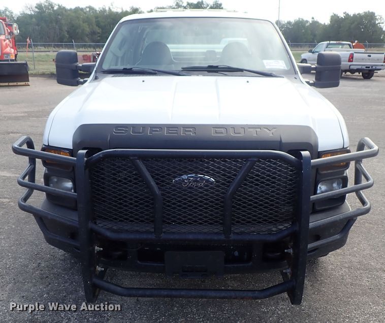 image for item DE1093 2008 Ford F250 Super Duty Crew Cab utility bed pickup truck