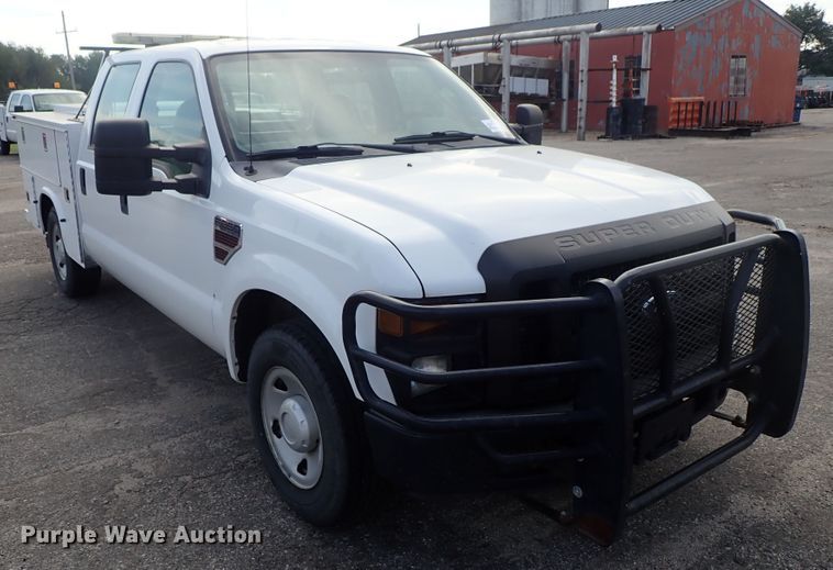 image for item DE1093 2008 Ford F250 Super Duty Crew Cab utility bed pickup truck